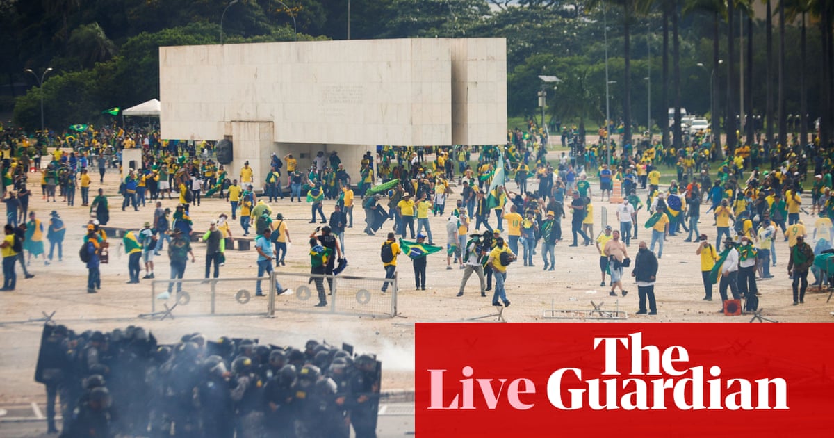 World leaders condemn scenes as Bolsonaro supporters attack political buildings - live
