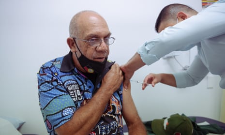 Cecil Phillips from Redfern receives his AstraZeneca vaccination at the Aboriginal Medical Service in Redfern