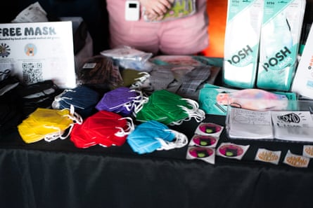 Masks lined up on a table.