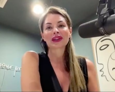 Screengrab of Natalie Jay Banus speaking into a microphone