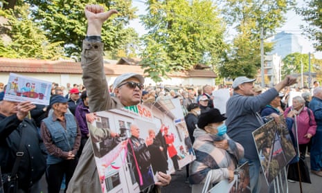 Supporters of the banned pro-Russian political party Sor (Shor) hold placards as they protest in front of the Constitutional Court headquarters in Chisinau, Moldova.