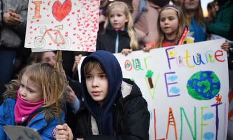 Schoolchildren take part in a nationwide student climate march in George Square on February 15, 2019 in Glasgow.