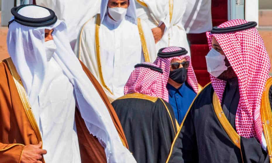 Crown Prince Mohammed bin Salman (right) welcomes Emir of Qatar Tamim bin Hamad Al-Thani at the airport in Al-Ula, Saudi Arabia.