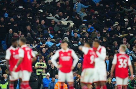 City fans do the Poznan after the third goal scored by Kevin De Bruyne