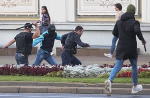 Minsk, Belarus: Plainclothes officers detain a participant in the March of Unity event in Victors Avenue. The announcement of the results of the 2020 Belarusian presidential election has provoked mass protests in Minsk and across Belarus