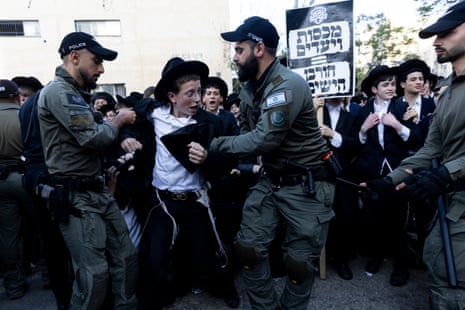 Hundreds of ultra-orthodox men and boys clashed with Israeli police on Thursday evening at a demonstration in Jerusalem.