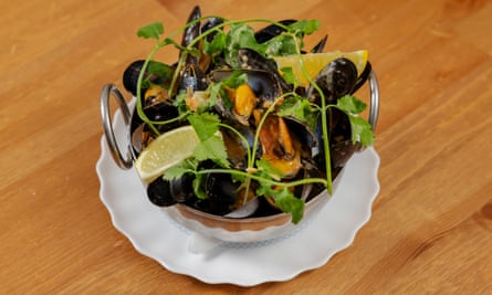 ‘In a deep tomato broth’: mussels.