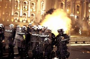 Belgrade, Serbia: police clash with demonstrators outside the parliament buildings. Crowds gathered to protest after President Aleksandar Vučić announced that a weekend curfew would be enforced after a surge in coronavirus cases
