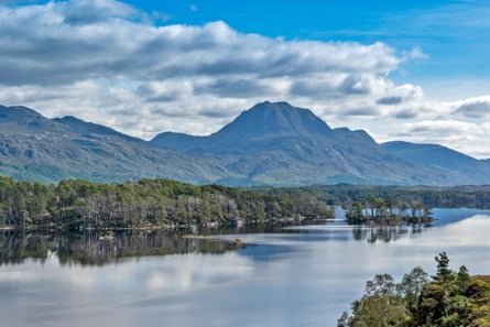 LOCH MAREE, WESTER ROSS, HIGHLANDS, SCOTLAND, LOOKING TOWARDS Slioch WITH THE ISLANDS AND MIRROR CALM WATER.