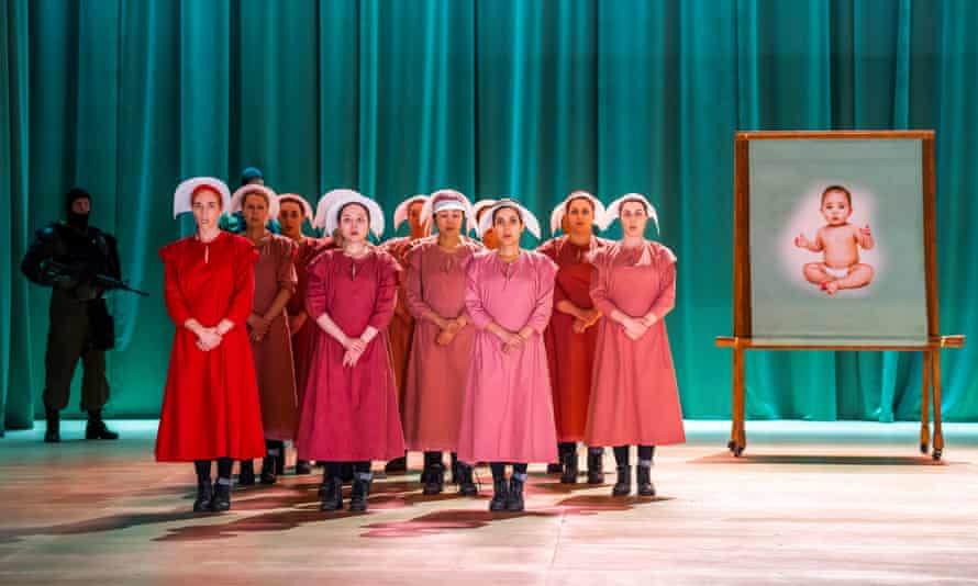 The full horror takes time to be revealed… Kate Lindsey (Offred), left, in Poul Ruder’s The Handmaid’s Tale
