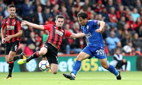 Leicester’s Shinji Okazaki and Bournemouth’s Lewis Cook challenge for the ball.
