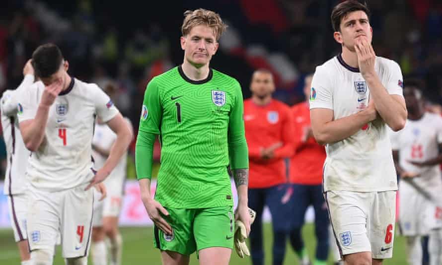 England goalkeeper Jordan Pickford (left) and centre-back Harry Maguire after defeat to Italy in the Euro 2020 final.
