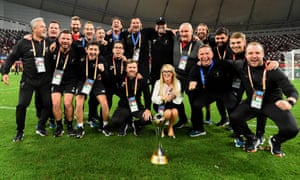 Liverpool manager Jurgen Klopp and the rest of the Melwood staff celebrate with the Club World Cup trophy after their victory over Flamengo in December 2019.