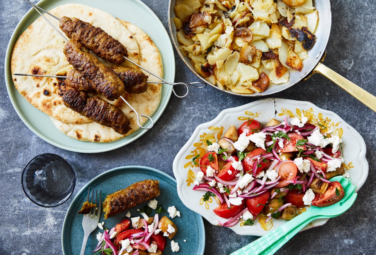 Olia Hercules' koobideh kebabs with her special family potato and onion recipe and her brother’s signature ‘Armenian’ salad.