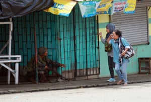 A soldier involved in an exchange with fleeing citizens in Marawi
