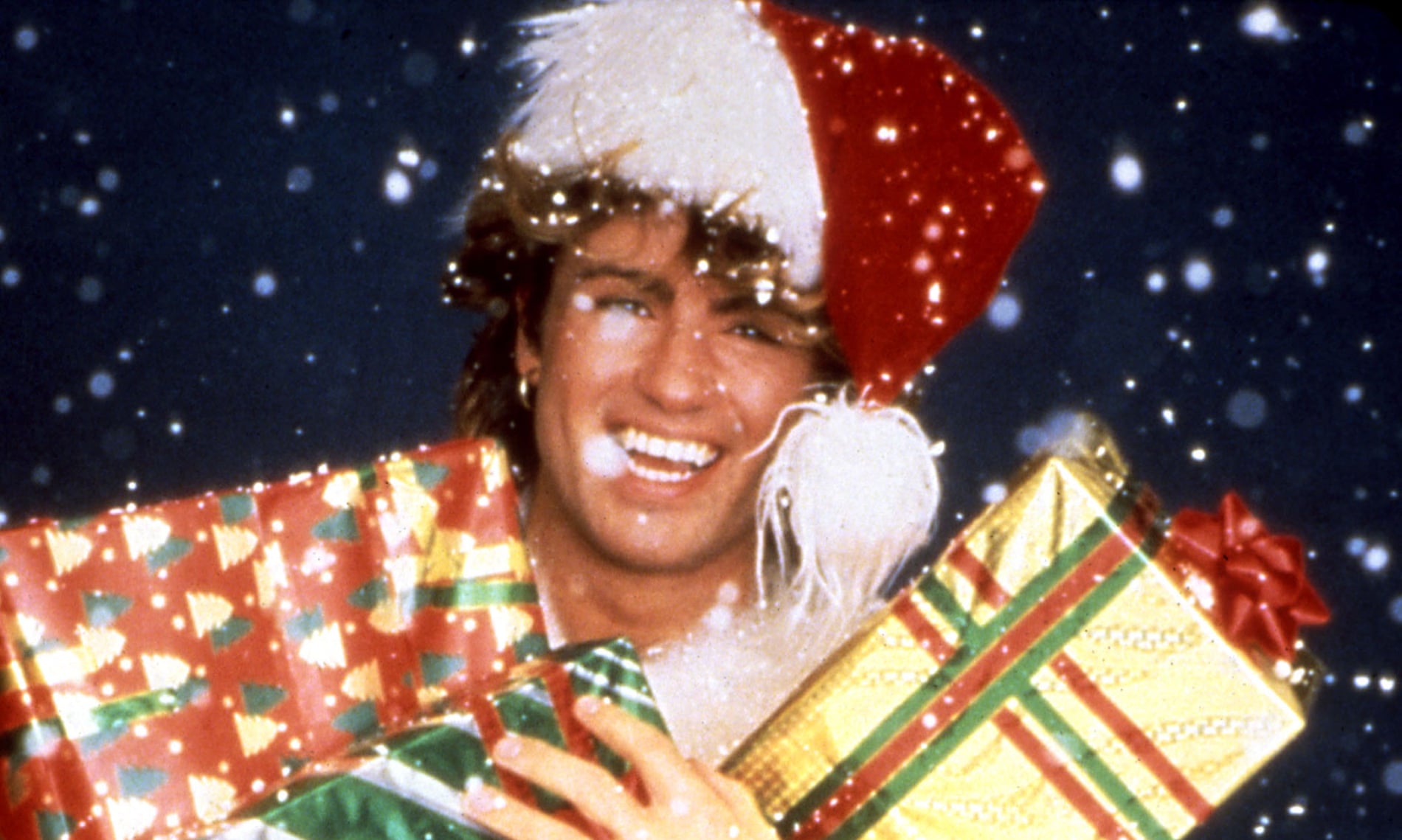 George Michael promoting Wham!’s 1984 single Last Christmas.