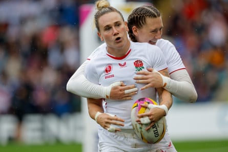 Meg Jones of England celebrates after scoring a try against Samoa.