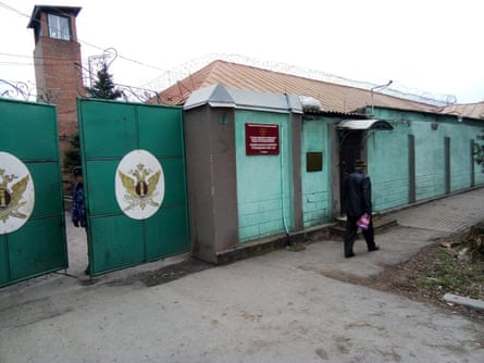 Green gates and a watchtower