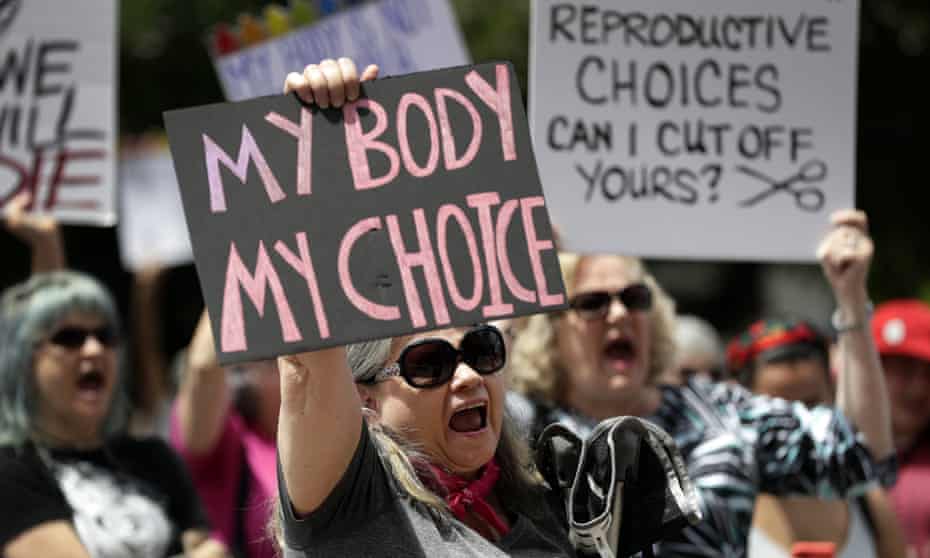 Pro-choice campaigners in Texas on Tuesday. Critics called the bill’s passage ‘shameful’ and noted it does not make exceptions for victims of race or incest.