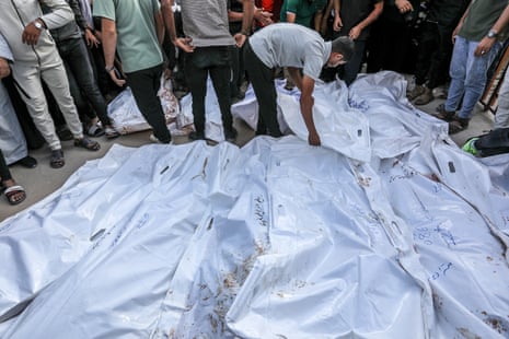 Relatives and loved ones of Palestinians mourn in Khan Younis.