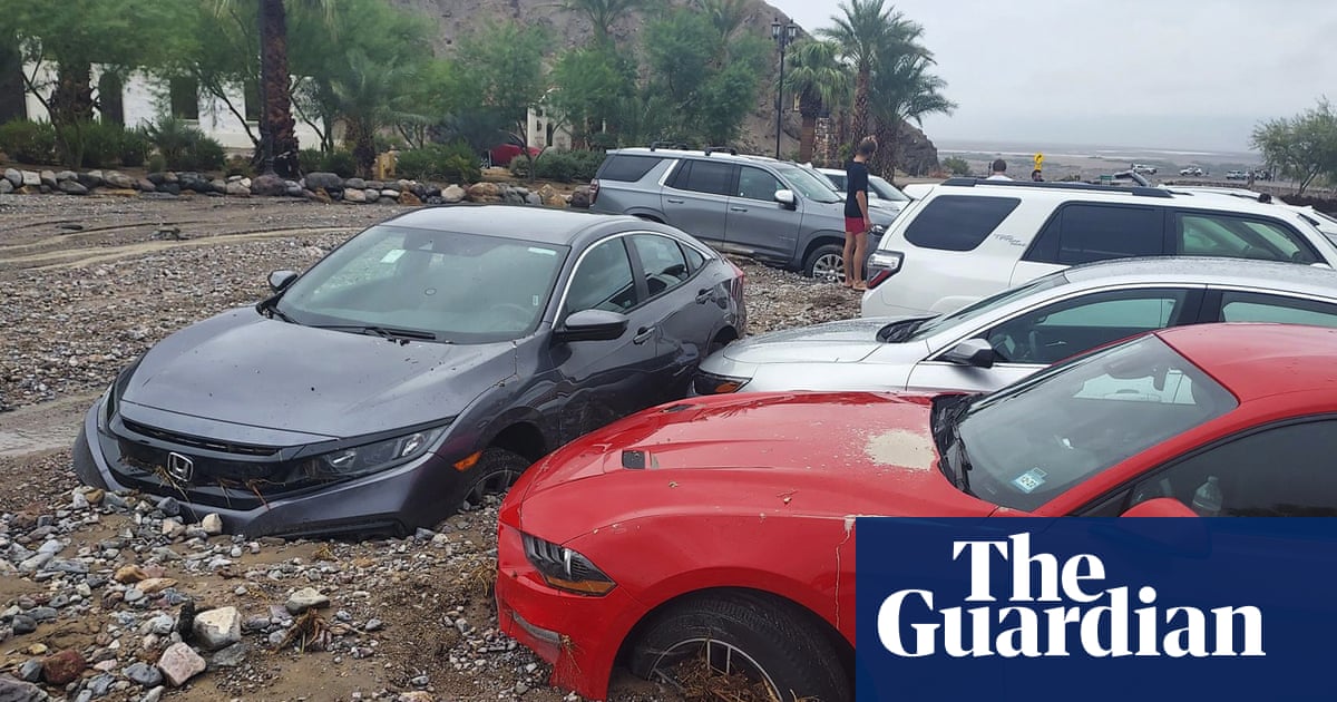 Flash floods bury cars and strand tourists in Death Valley - The Guardian