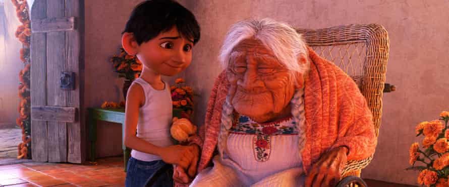 Miguel, voiced Anthony Gonzalez, with his great-great-grandmother, Mamá Coco (Ana Ofelia Murguía) in Coco.