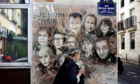 A street painting pays tribute to members of the Charlie Hebdo newspaper who were killed by gunmen in January 2015.