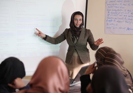 Woman conducts a lesson.