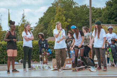 Lucy Adams, centre, teaches girls to skate at the Level Skatepark in Brighton