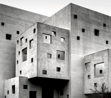 a fortress built for finger paint and nap time, a Brutalist bunker reinterpreted as a playground