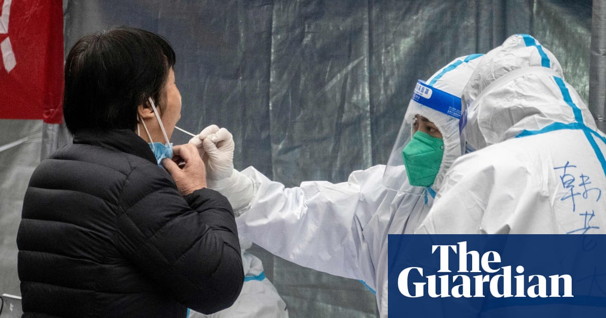 Chinese city of 1.2 million people locked down after three Covid cases emerge