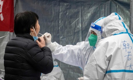 A resident undergoes a test for coronavirus in Xi'an in China's northern Shaanxi province.