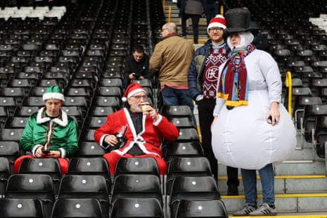 23 December 2023 Burnley fans arrive at Craven Cottage wearing Christmas themed fancy dress. Burnley won the match 2-0.
