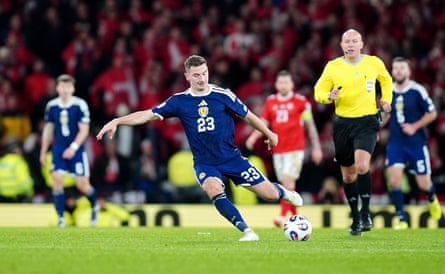 Scotland’s Kenny McLean takes aim from the halfway line