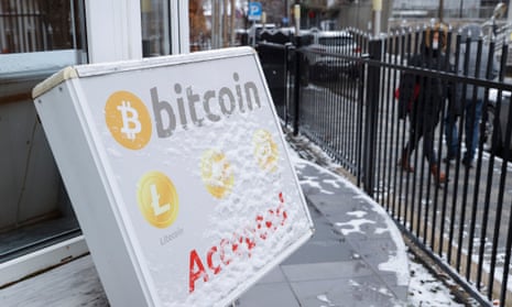 A bitcoin sign in front of a crypto exchange office in Pristina, Kosovo, 10 January 2022
