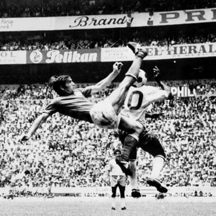 Italy’s Tarcisio Burgnich acrobatically attempts to clear the ball away from Brazil’s Pele during the 1970 World Cup final.