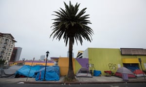 Tents line the sidewalk in San Diego California, a city that is experiencing a grave homelessness crisis.