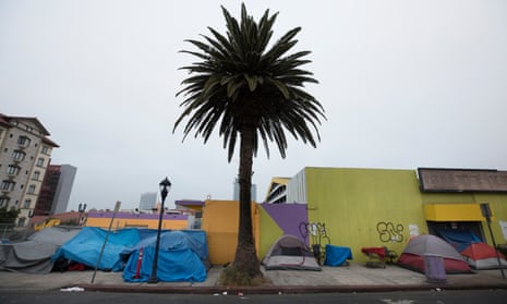 Tents line the sidewalk in San Diego California, a city that is experiencing a grave homelessness crisis. 