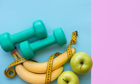 Fitness equipment, fresh fruit and a measuring tape over turquoise blue and pastel purple background.