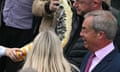 BRITAIN-POLITICS-VOTE-REFORM-Nigel Farage reacts as he is about to be hit in the face with the contents of a drinks cup, during his general election campaign launch in Clacton-on-Sea