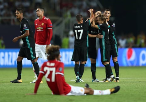 Real Madrid’s Cristiano Ronaldo and Luka Modric celebrate at full-time.
