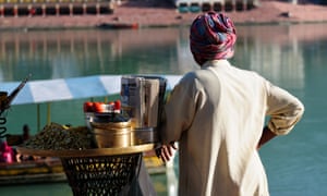 Street vendor by the river hooghly, India.