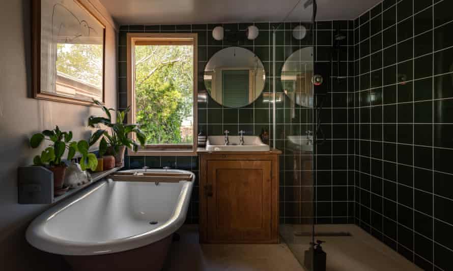 The bathroom extension with shower and freestanding bath.