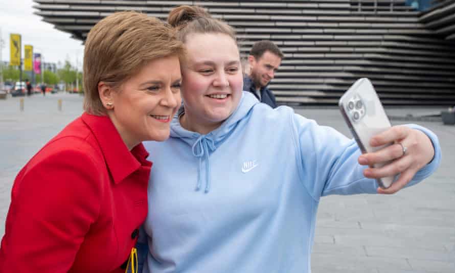 The first minister of Scotland, Nicola Sturgeon, poses for selfies outside the V&A Dundee today