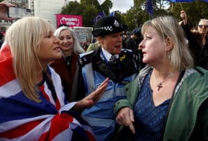Pro- and anti-Brexit demonstrators argue in Parliament Square.