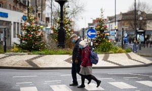 People wearing masks in Wales