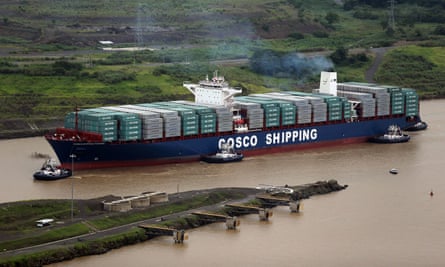 The Cosco Shipping Panama cargo ship prepares to cruise past the old Pedro Miguel locks, as it heads towards the new Cocolí locks, on Sunday.