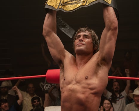 film still of a boxer holding a trophy above his head in a boxing ring