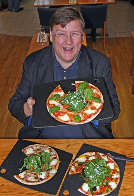 Charles Campion sampling pizzas as part of his work as Evening Standard food critic.