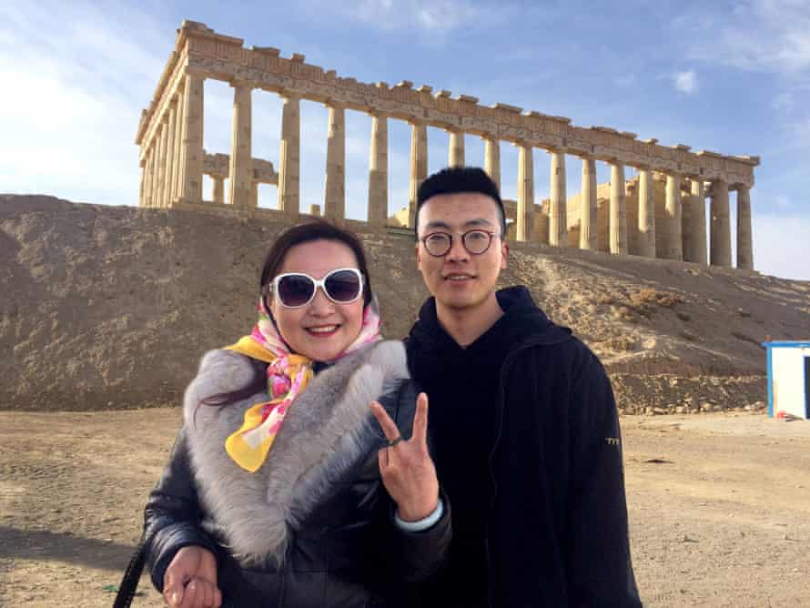 Chinese tourists visiting the replica of the Parthenon near Lanzhou New Area.
